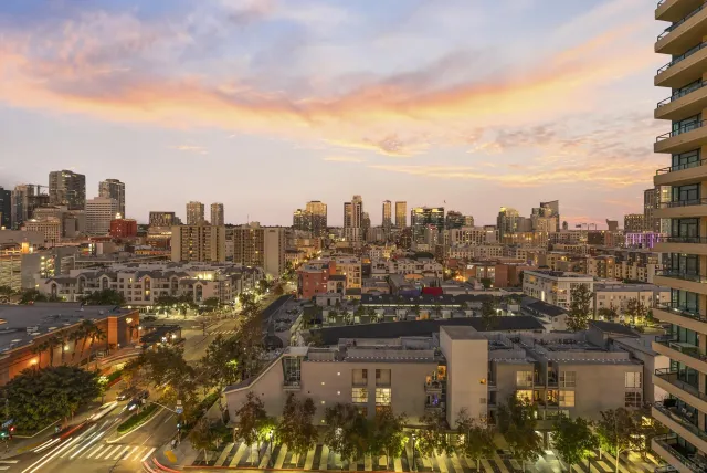 a view of a city with tall buildings