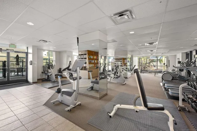 a view of a room with gym equipment