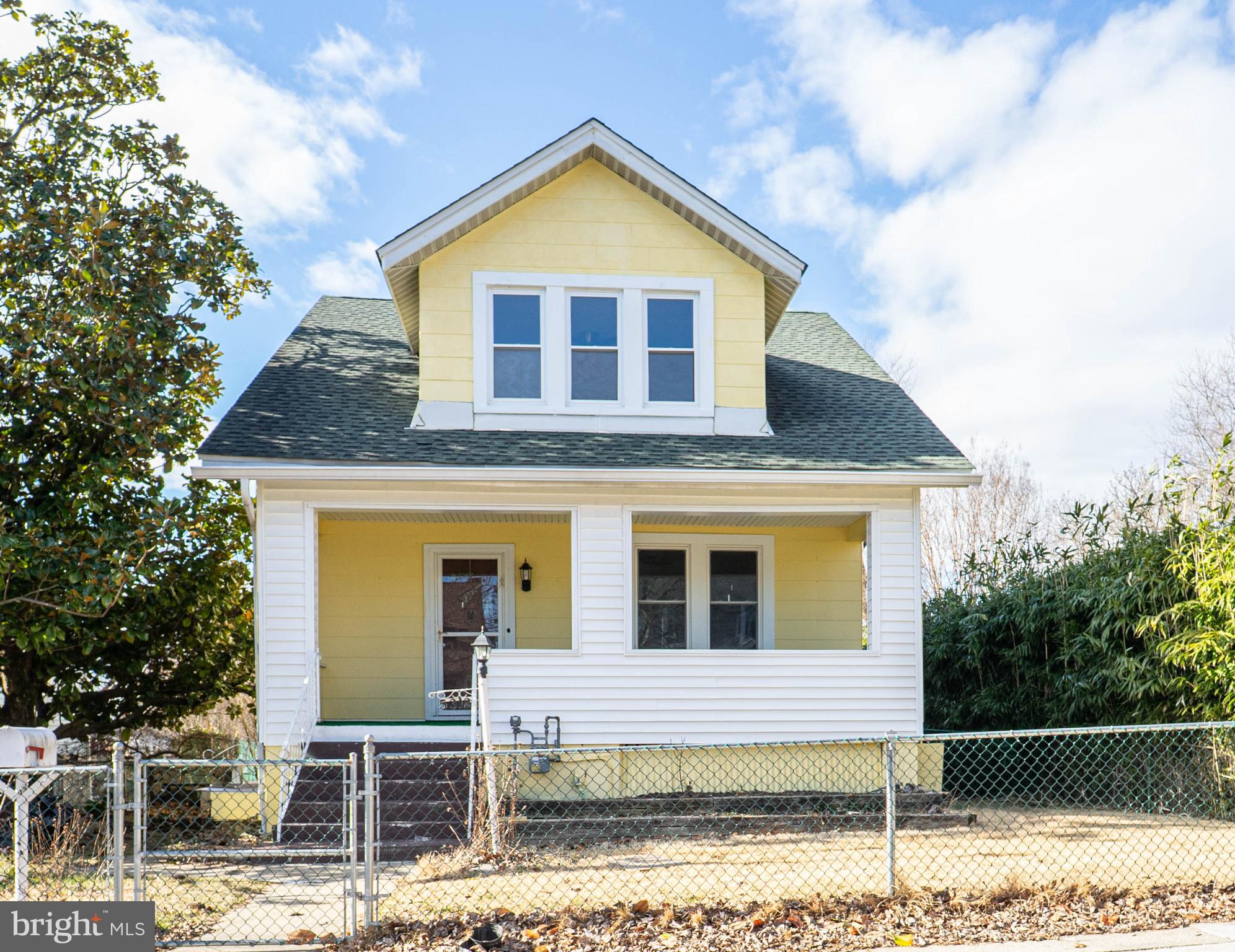 5312 Catalpha Road Baltimore, MD 21214 - Photo 2 of 41 a view of a house with a yard