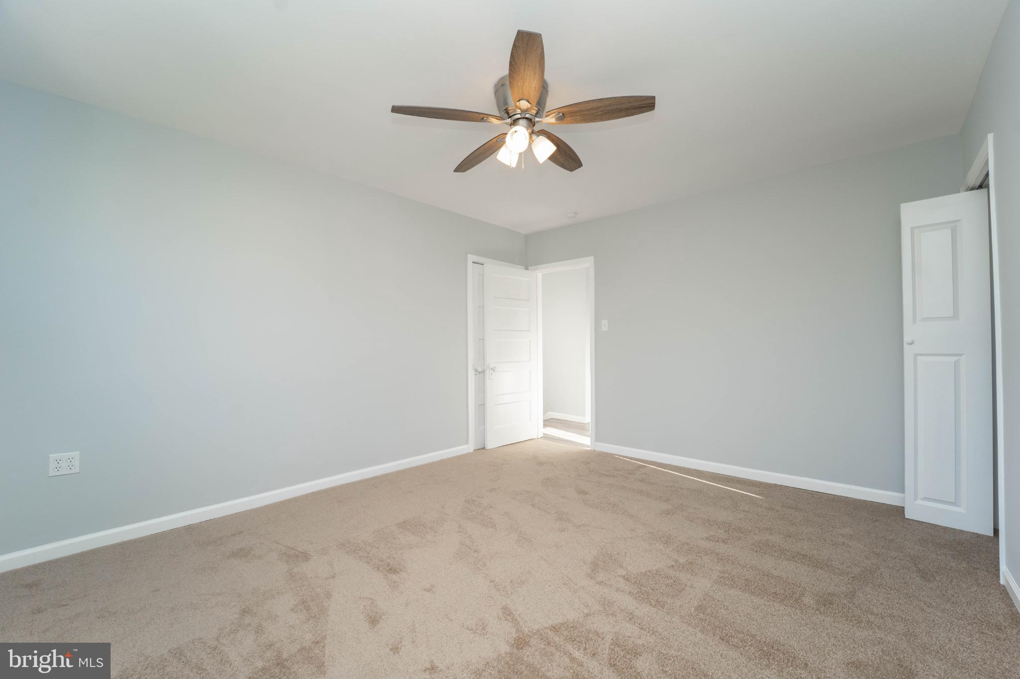 5312 Catalpha Road Baltimore, MD 21214 - Photo 33 of 41 a view of room with window and ceiling fan
