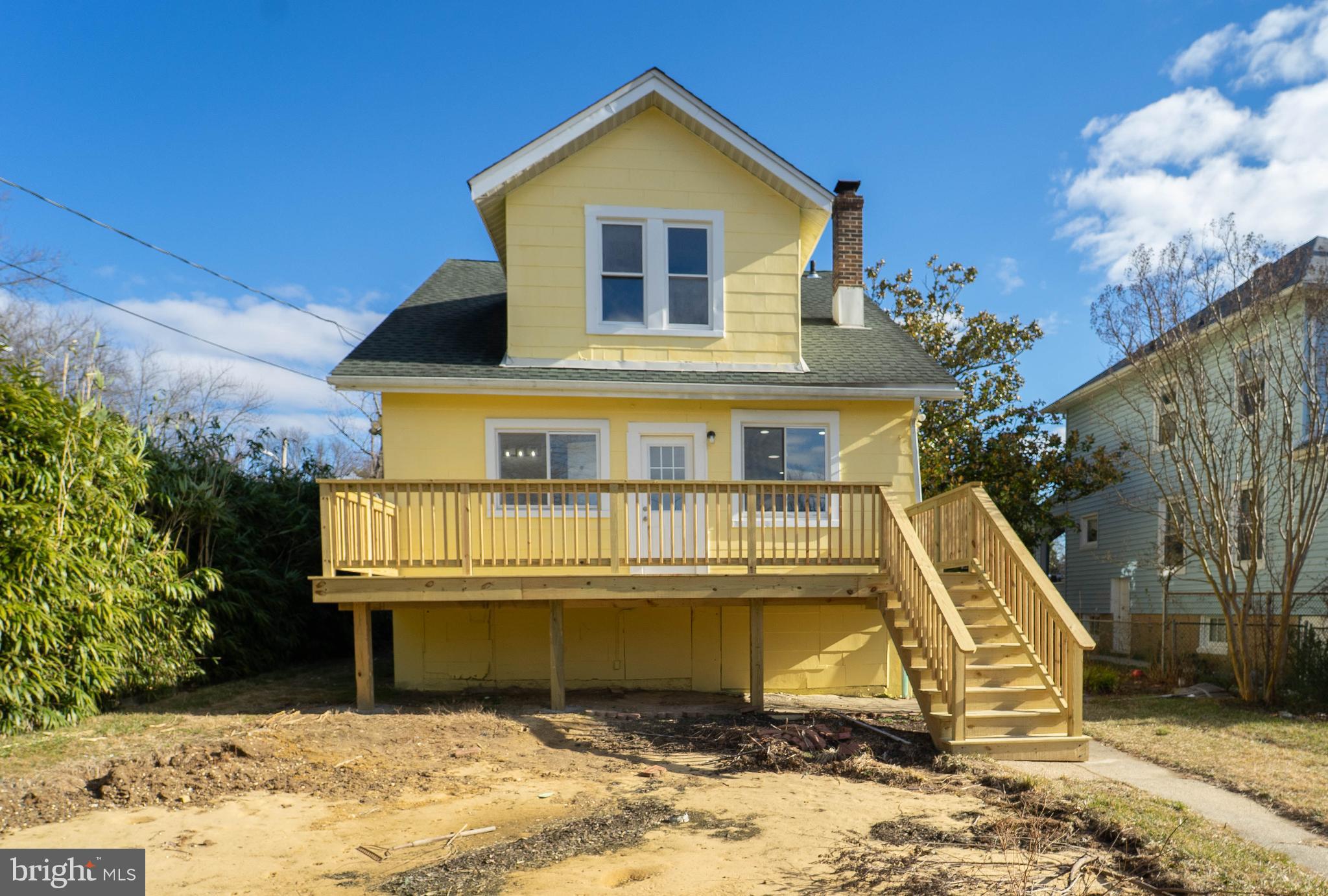 5312 Catalpha Road Baltimore, MD 21214 - Photo 6 of 41 a front view of a house with a yard