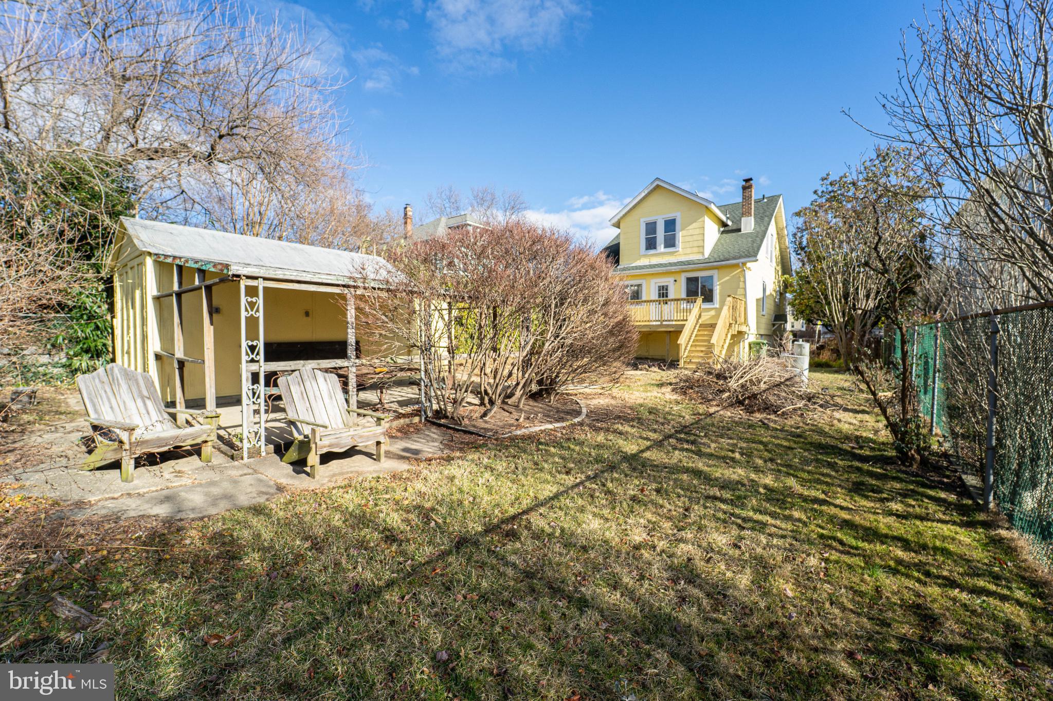 5312 Catalpha Road Baltimore, MD 21214 - Photo 7 of 41 a front view of a house with a yard
