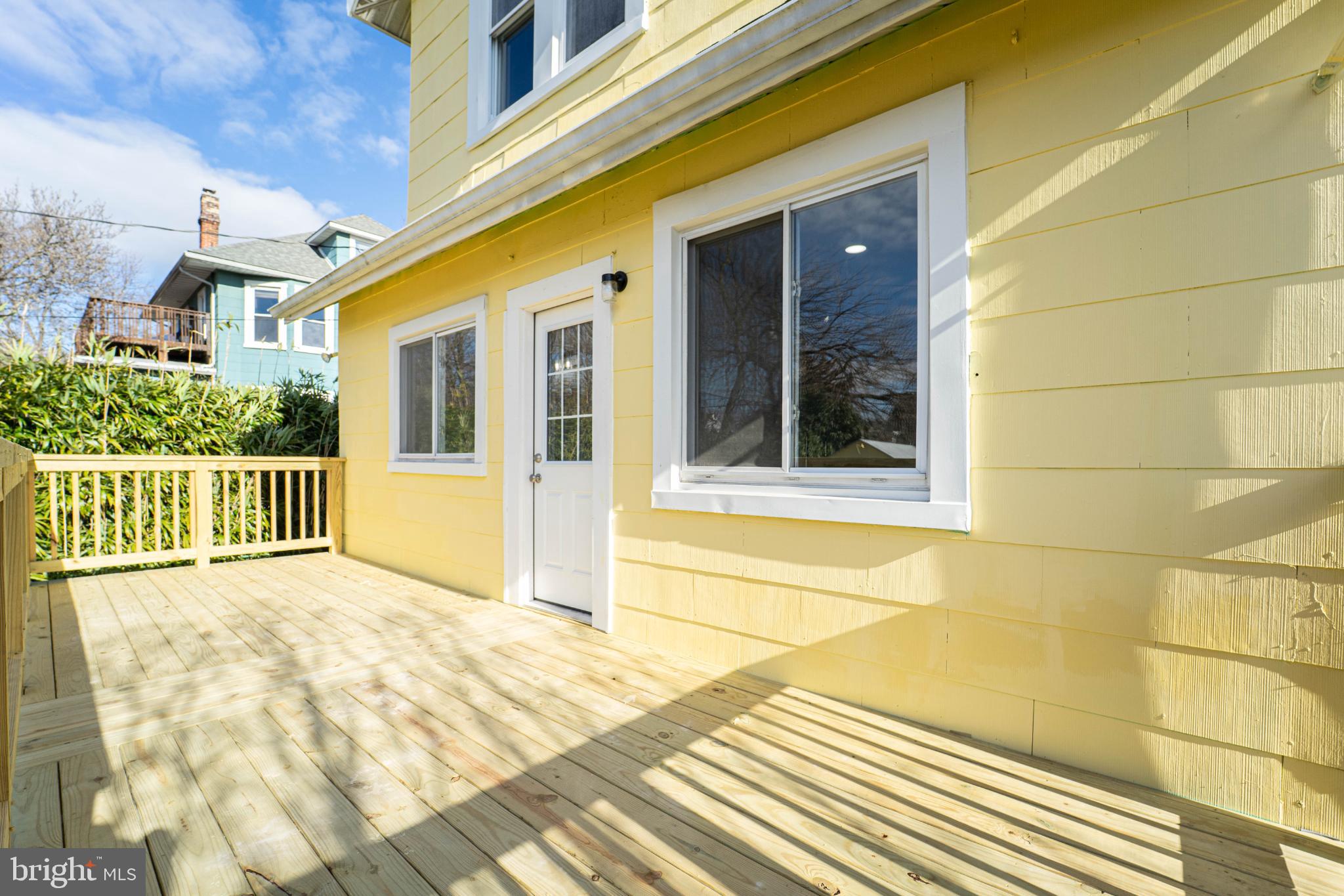 5312 Catalpha Road Baltimore, MD 21214 - Photo 8 of 41 a view of a house with a large window