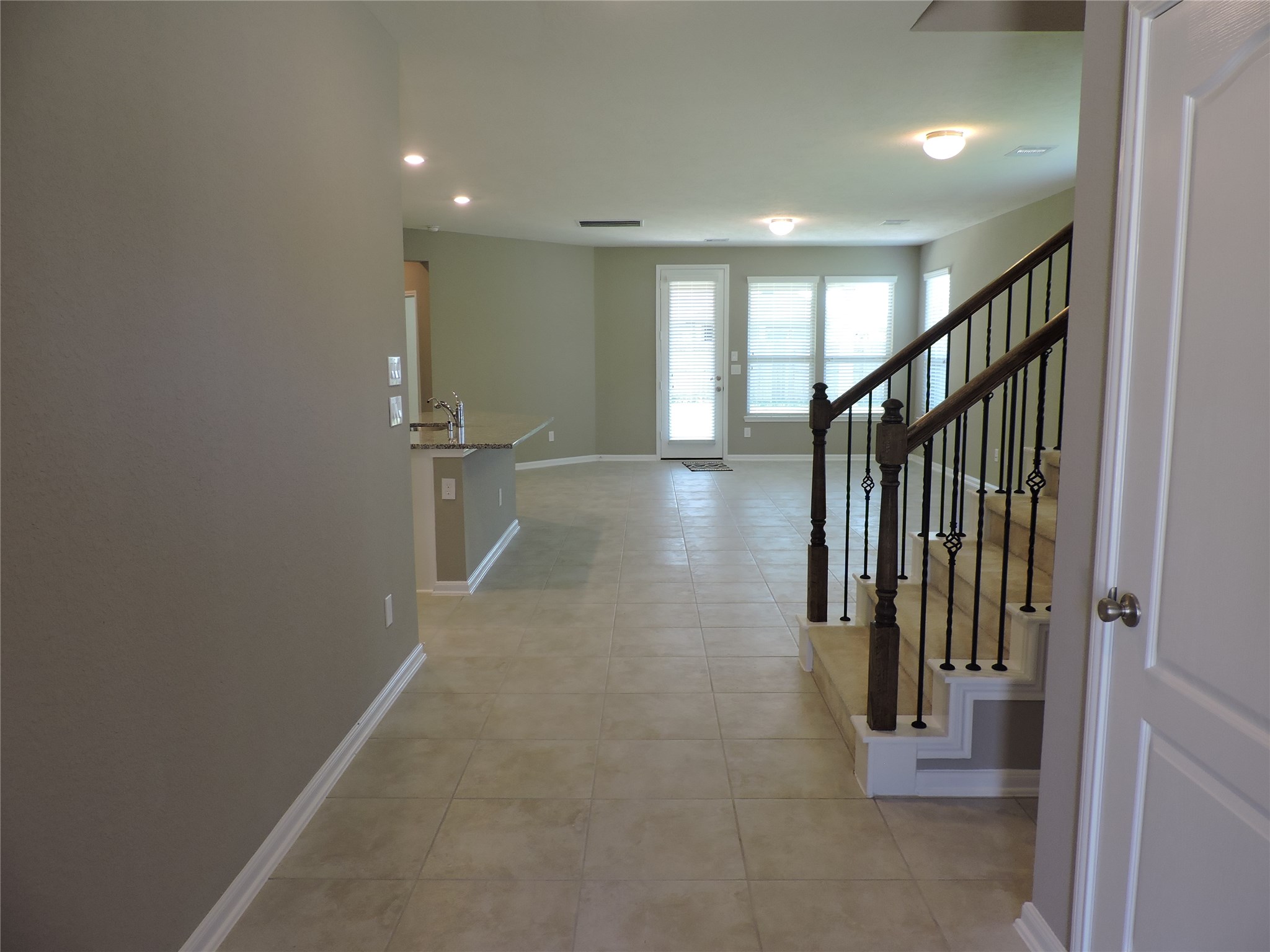 1102 Upton Court Conroe, TX 77304 - Photo 30 of 30 a view of a hallway with windows