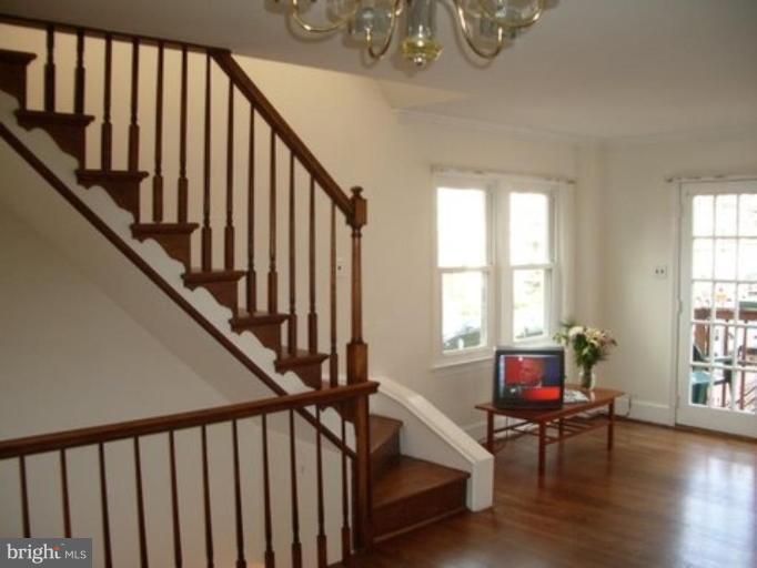 539 3rd Street Northeast Washington, DC 20002 - Photo 19 of 29 a view of entryway with wooden floor and stairs