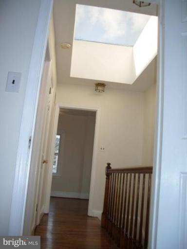 539 3rd Street Northeast Washington, DC 20002 - Photo 25 of 29 a view of a hallway with wooden floor