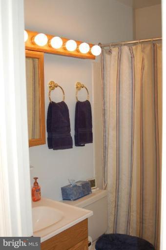 539 3rd Street Northeast Washington, DC 20002 - Photo 7 of 29 a bathroom with a sink and a mirror