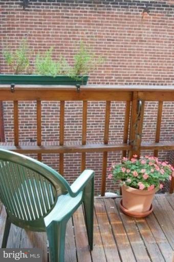 539 3rd Street Northeast Washington, DC 20002 - Photo 8 of 29 a view of a chair and tables in the balcony