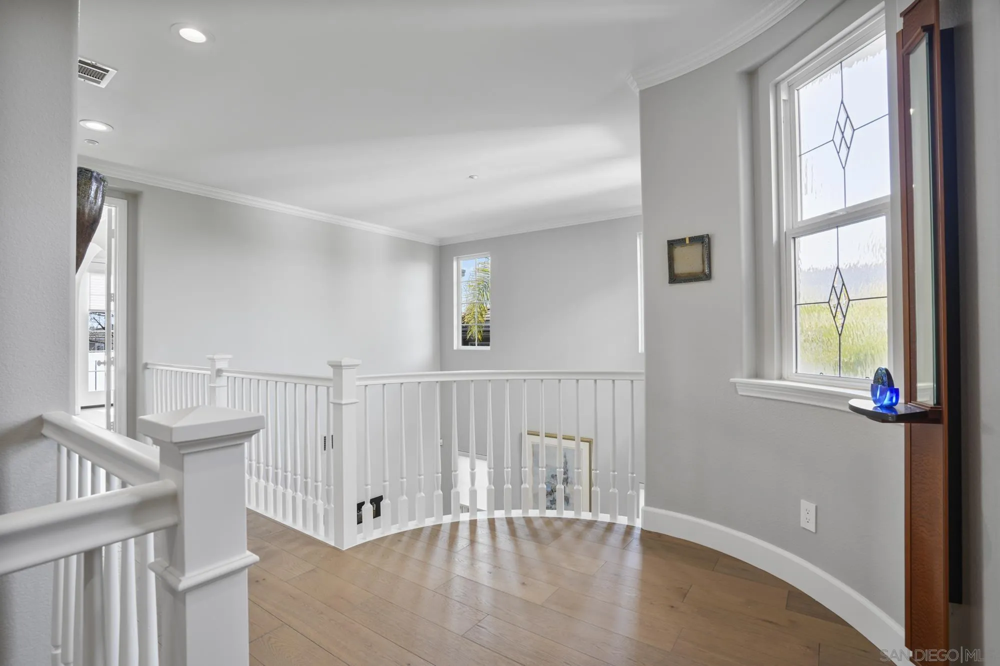 684 Cypress Hills Drive Encinitas, CA 92024 - Photo 19 of 43 a view of an entryway with wooden floor