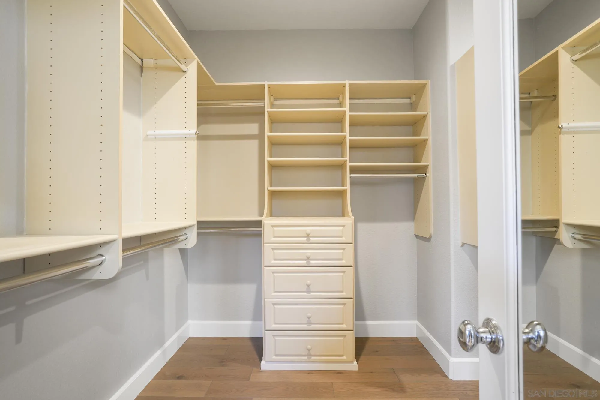 684 Cypress Hills Drive Encinitas, CA 92024 - Photo 25 of 43 a view of walk in closet with empty racks