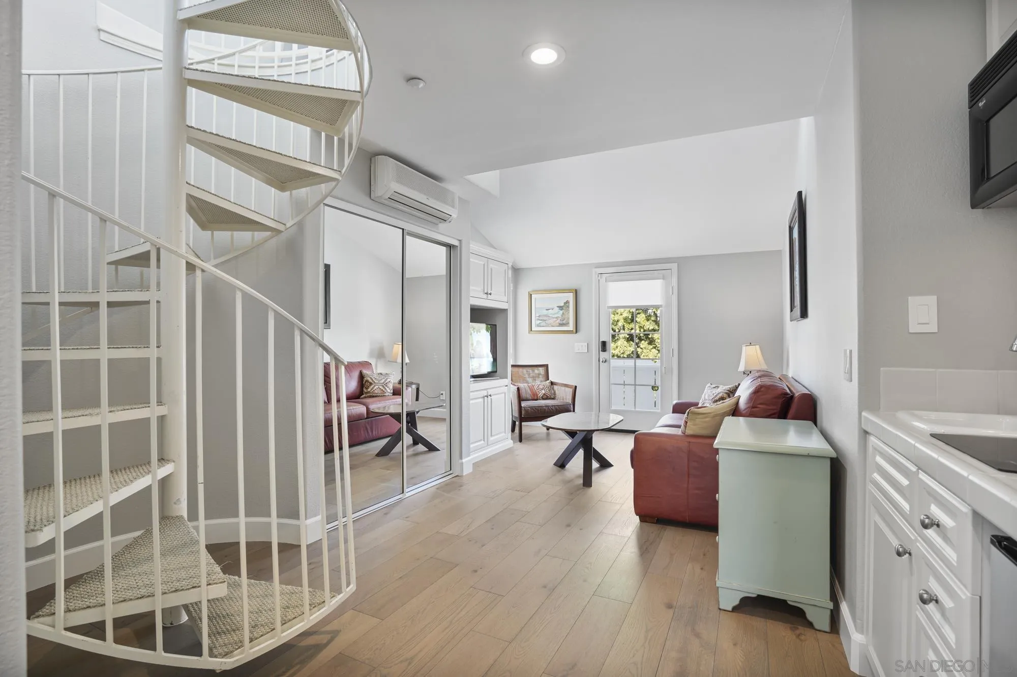 684 Cypress Hills Drive Encinitas, CA 92024 - Photo 29 of 43 a living room with furniture a dining table and a large window