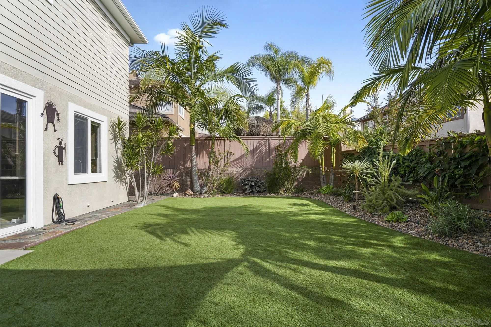 684 Cypress Hills Drive Encinitas, CA 92024 - Photo 38 of 43 a green field with some trees in front of it