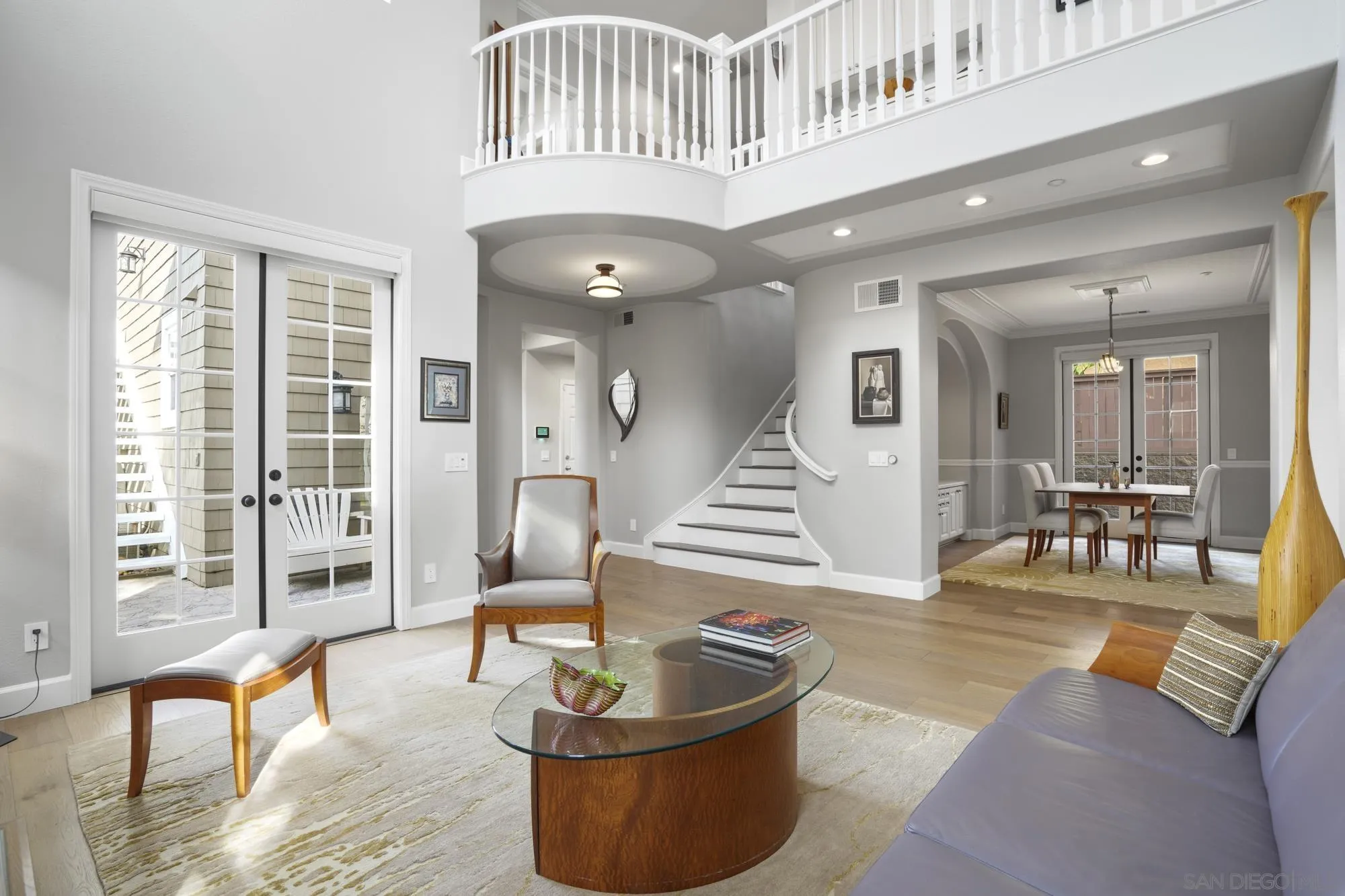 684 Cypress Hills Drive Encinitas, CA 92024 - Photo 8 of 43 a living room with furniture and a large window