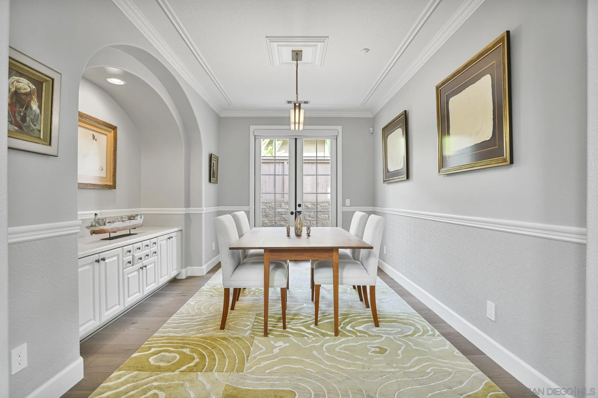 684 Cypress Hills Drive Encinitas, CA 92024 - Photo 9 of 43 a view of a dining room with furniture