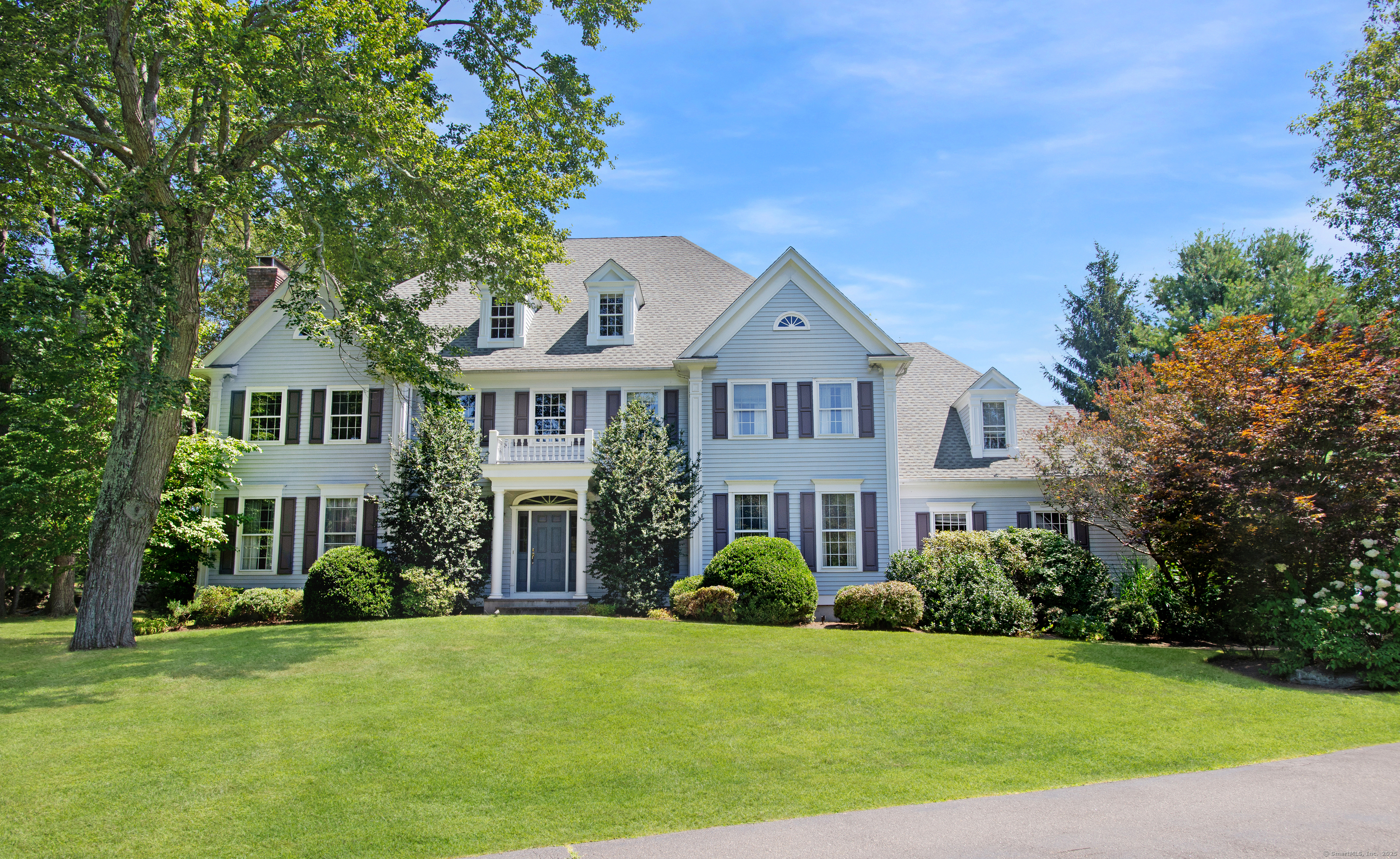 80 Nod Road Ridgefield, CT 06877 - Photo 1 of 1 a front view of a house with a yard