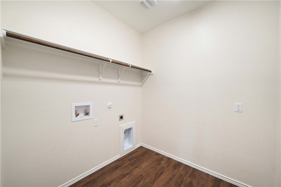 820 Kates Way Hutto, TX 78634 - Photo 12 of 30 a view of small space with racks on the wall