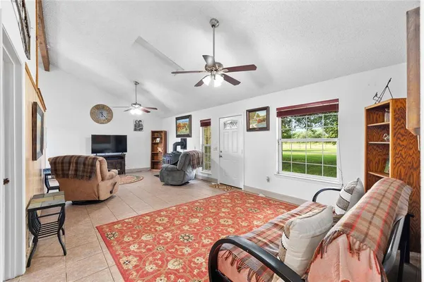 a bedroom with furniture or couch and a window