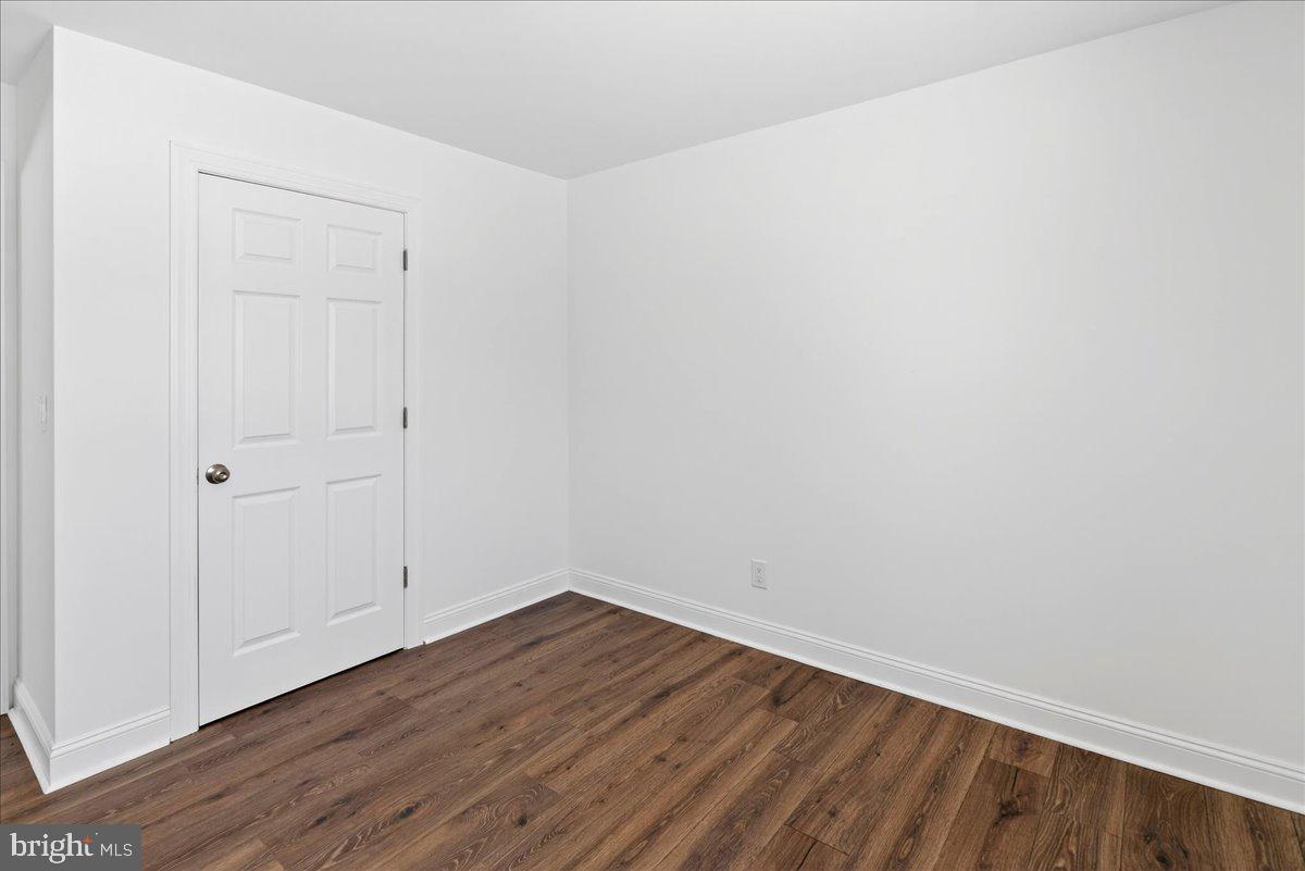 464 Sykesville Road Wrightstown, NJ 08562 - Photo 22 of 32 a view of an empty room with wooden floor