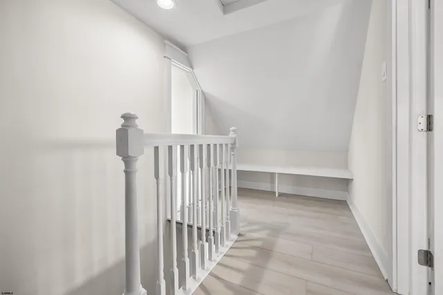 a view of a room with racks on the wall