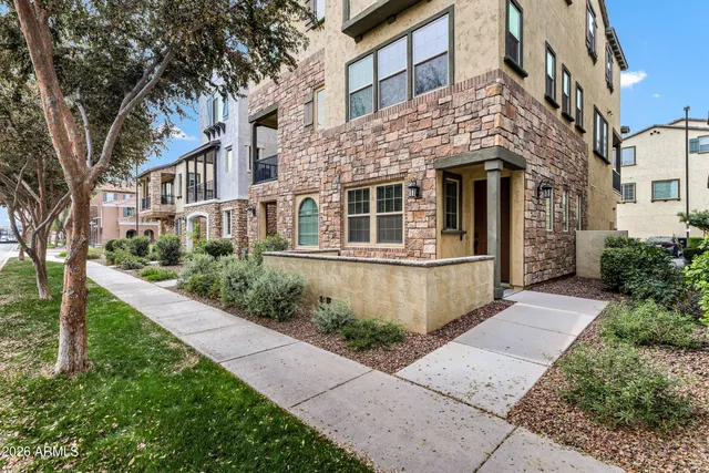 a view of a building with a garden