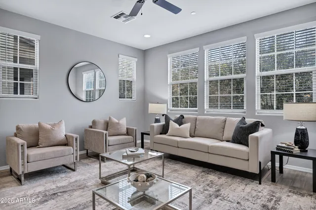 a living room with furniture and a window