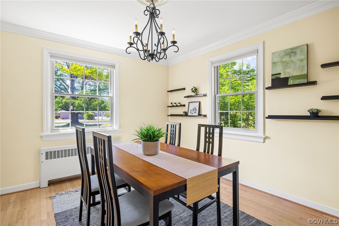 3917 Brook Road Richmond, VA 23227 - Photo 12 of 41 a view of a dining room with furniture window and wooden floor