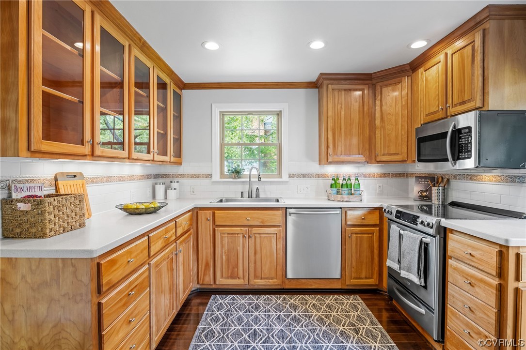 3917 Brook Road Richmond, VA 23227 - Photo 14 of 41 a kitchen with stainless steel appliances granite countertop sink stove microwave and cabinets