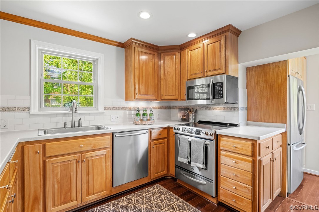 3917 Brook Road Richmond, VA 23227 - Photo 17 of 41 a kitchen with stainless steel appliances granite countertop a stove a sink a microwave and cabinets