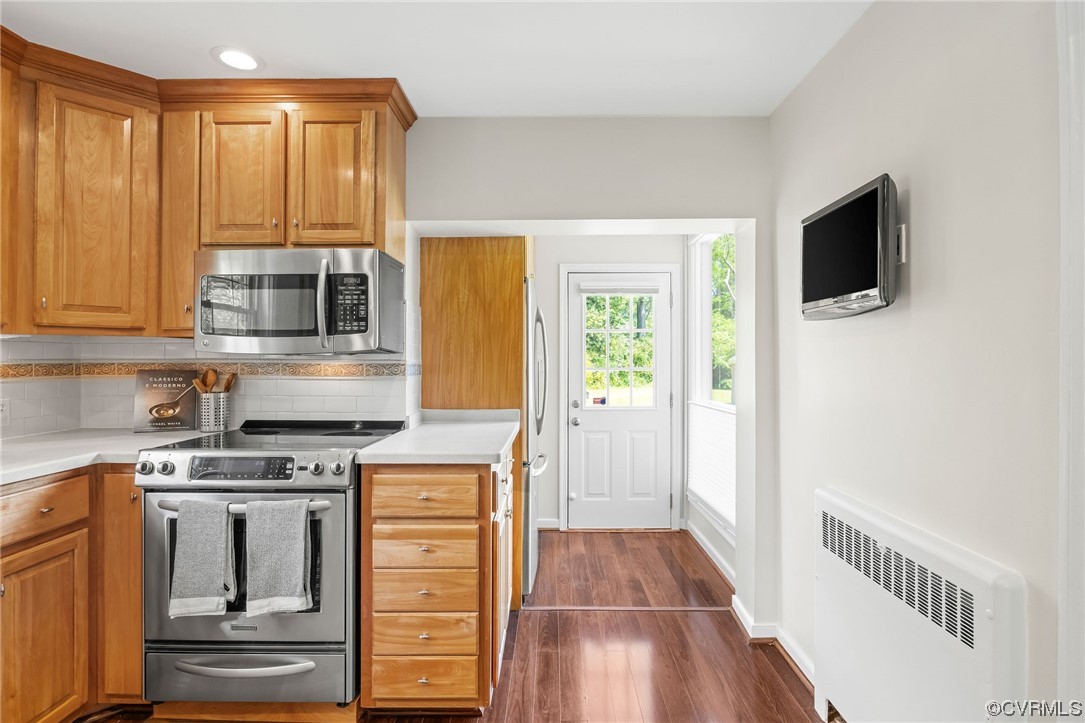 3917 Brook Road Richmond, VA 23227 - Photo 18 of 41 a kitchen with a stove and a microwave