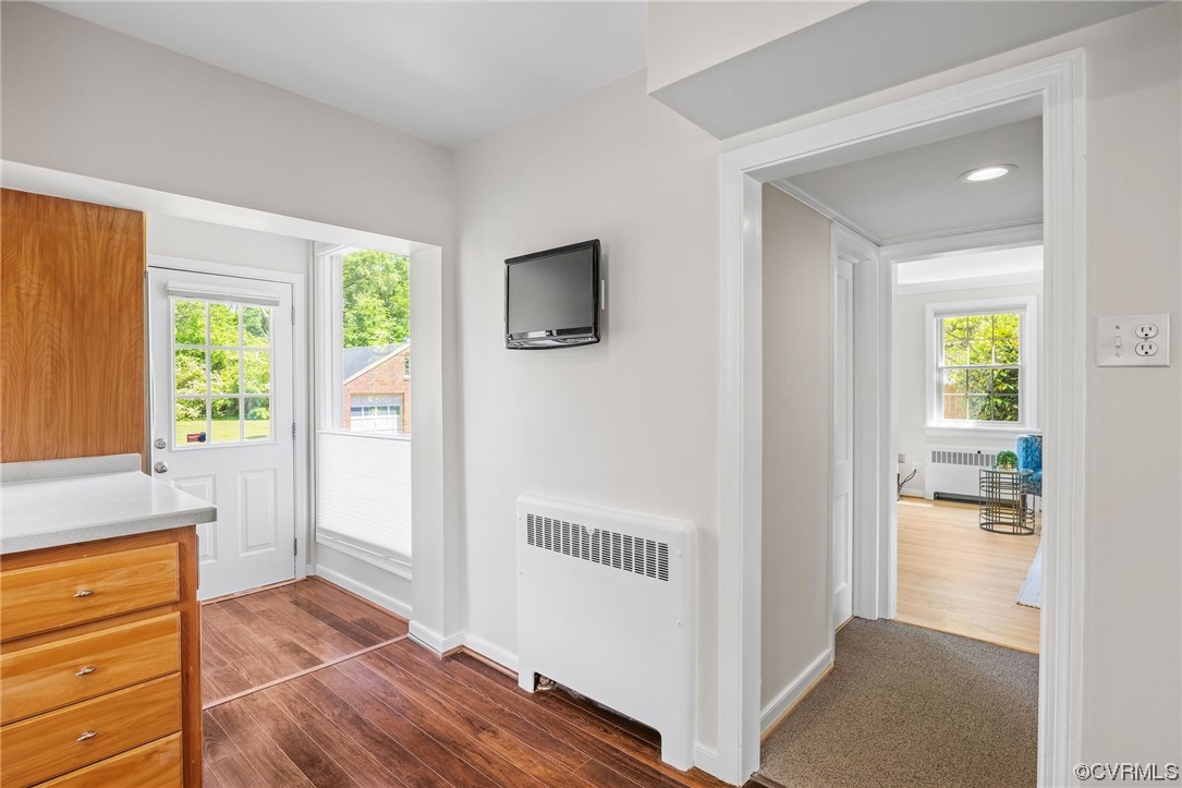 3917 Brook Road Richmond, VA 23227 - Photo 19 of 41 a view of a hallway with wooden floor and a livingroom