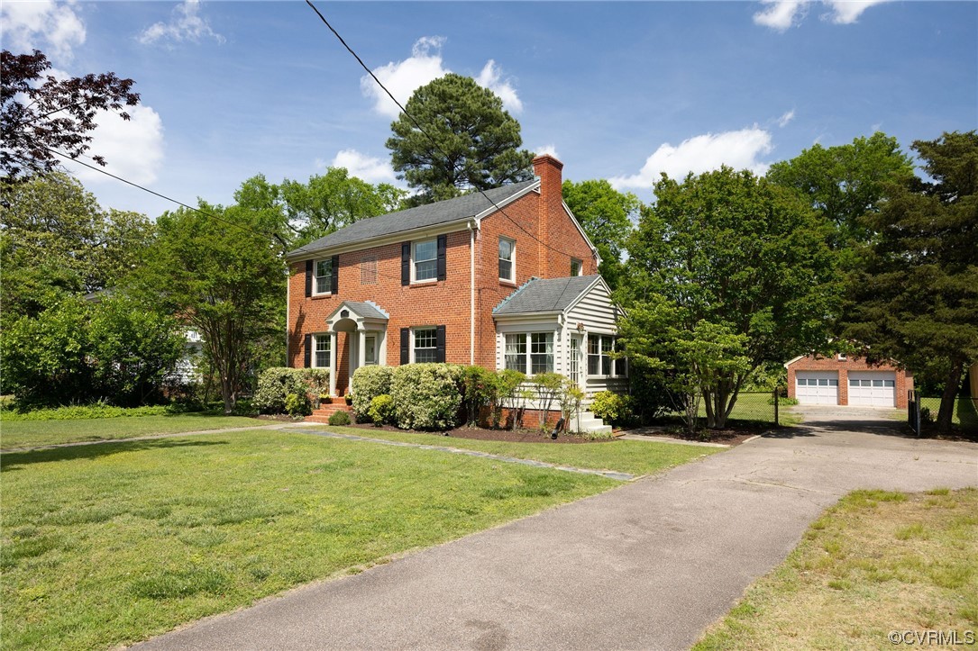 3917 Brook Road Richmond, VA 23227 - Photo 2 of 41 a front view of a house with a yard