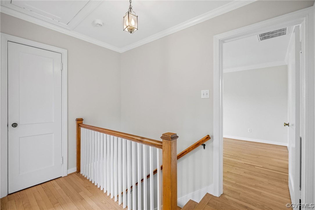 3917 Brook Road Richmond, VA 23227 - Photo 21 of 41 a view of a hallway with a white walls and wooden floor