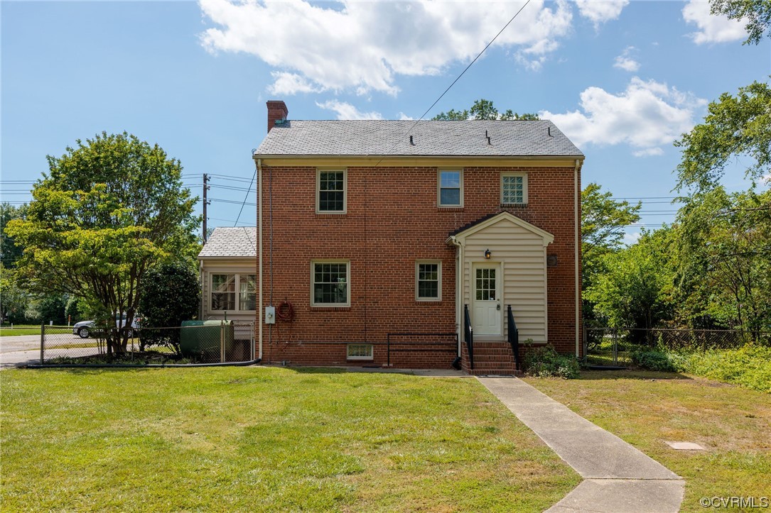 3917 Brook Road Richmond, VA 23227 - Photo 39 of 41 a front view of a house with a yard