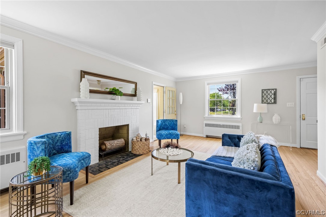 3917 Brook Road Richmond, VA 23227 - Photo 6 of 41 a living room with furniture and a fireplace
