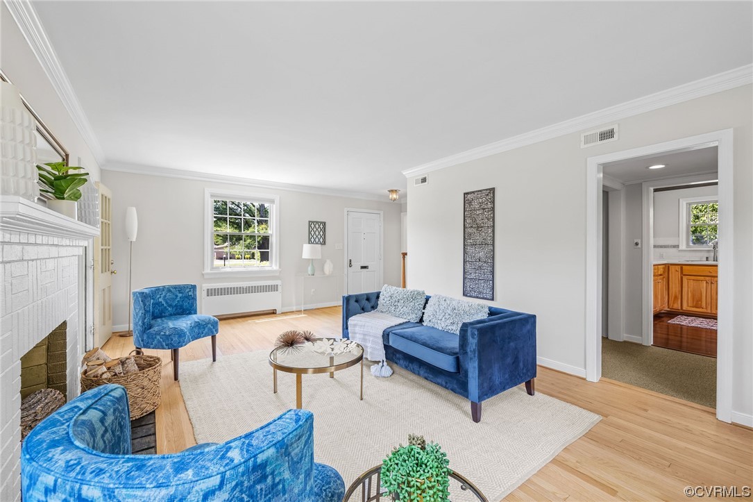 3917 Brook Road Richmond, VA 23227 - Photo 7 of 41 a living room with furniture and a fireplace