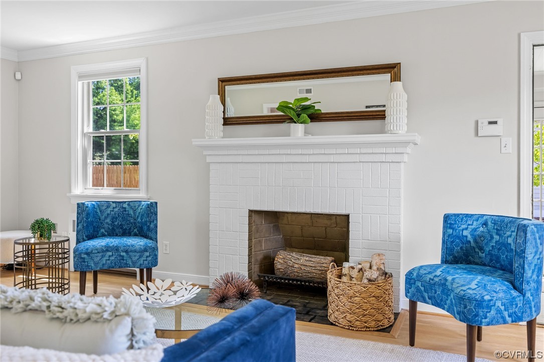3917 Brook Road Richmond, VA 23227 - Photo 8 of 41 a living room with furniture and a fireplace