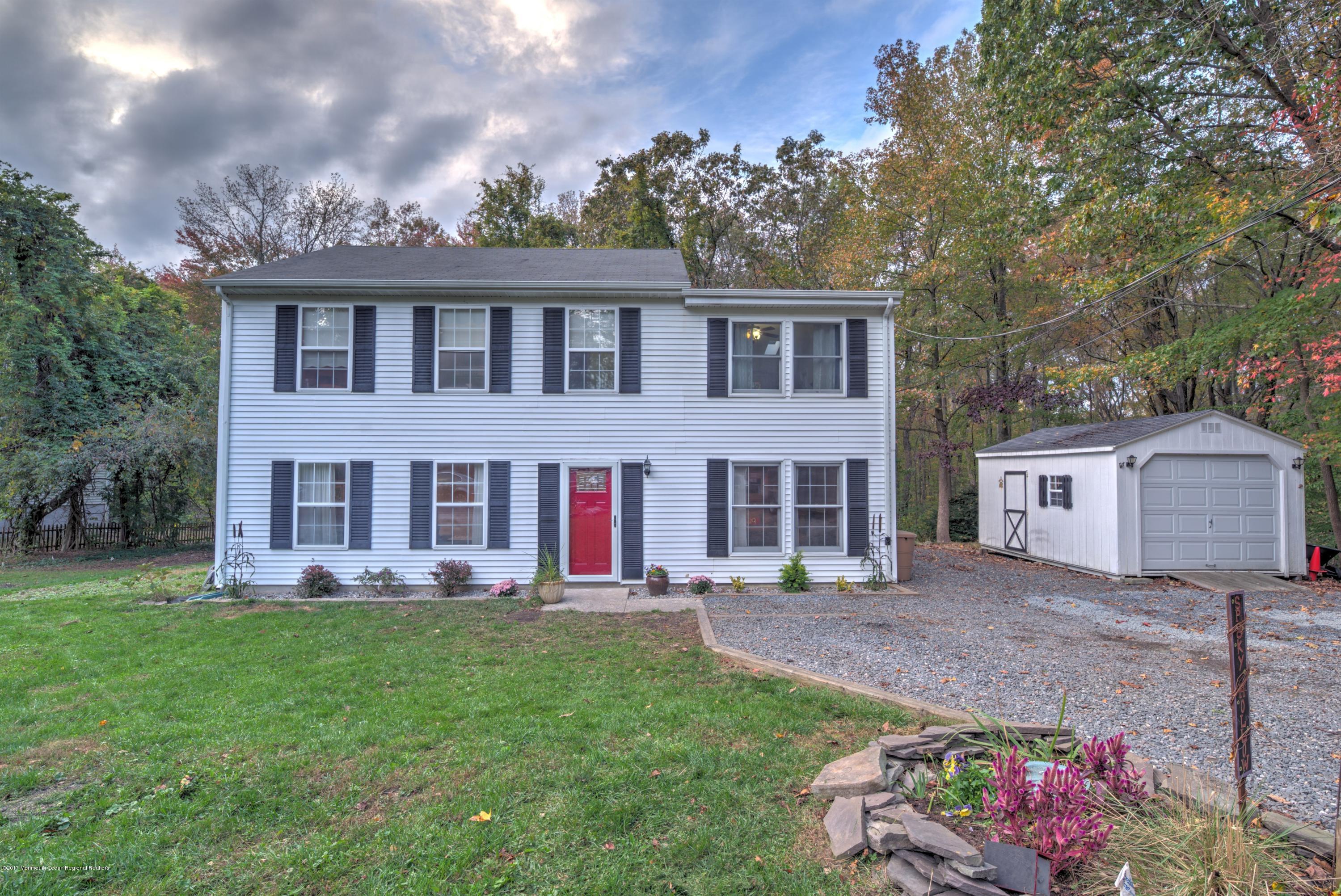 15 Reiner Road Cream Ridge, NJ 08514 - Photo 1 of 27 a front view of a house with garden