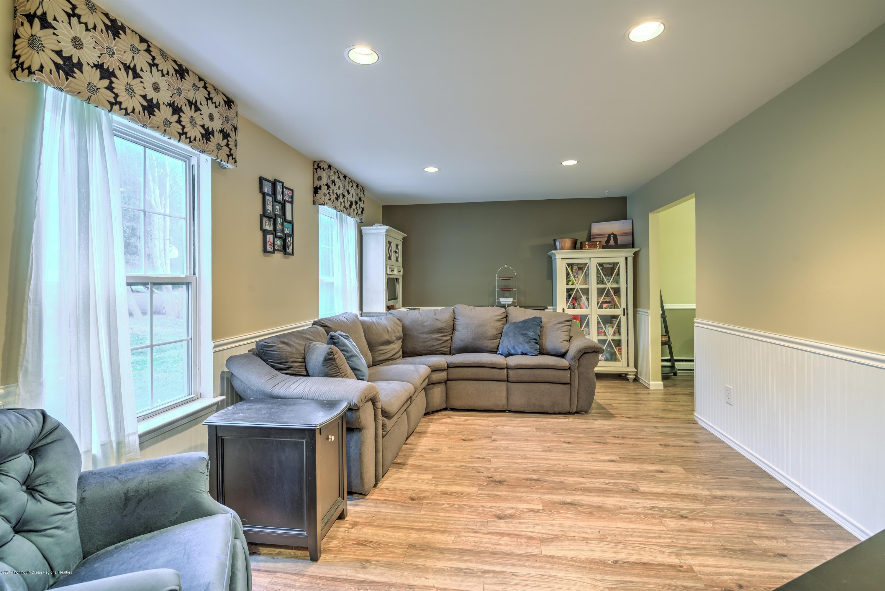 15 Reiner Road Cream Ridge, NJ 08514 - Photo 3 of 27 a living room with furniture and a rug