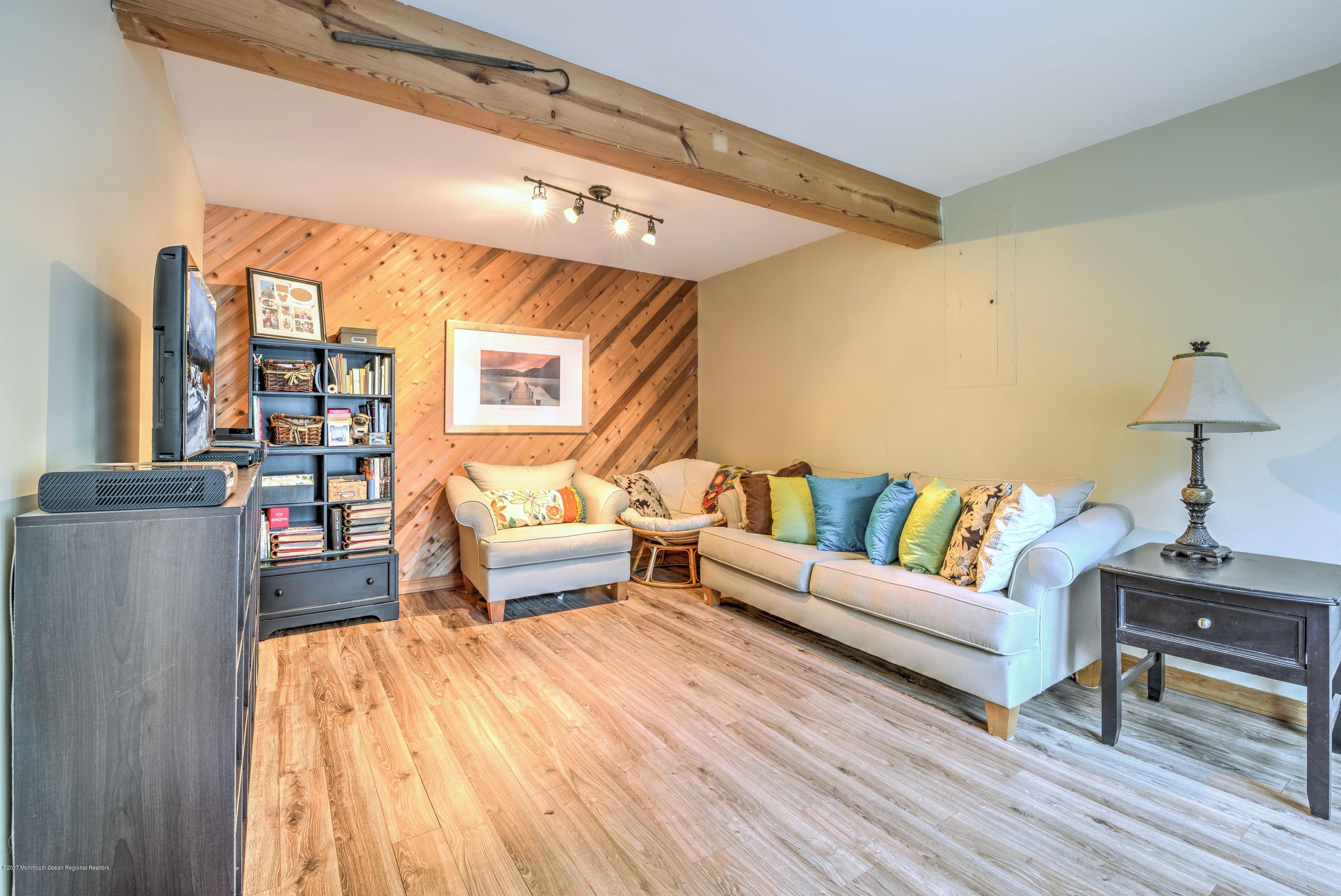 15 Reiner Road Cream Ridge, NJ 08514 - Photo 5 of 27 a living room with furniture and a wooden floor
