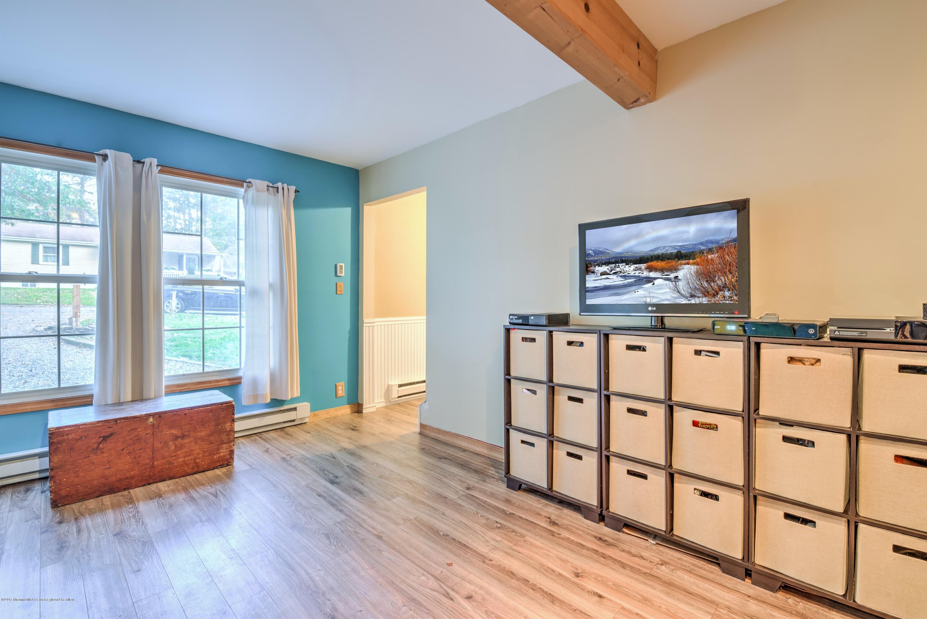 15 Reiner Road Cream Ridge, NJ 08514 - Photo 7 of 27 a living room with furniture and a window