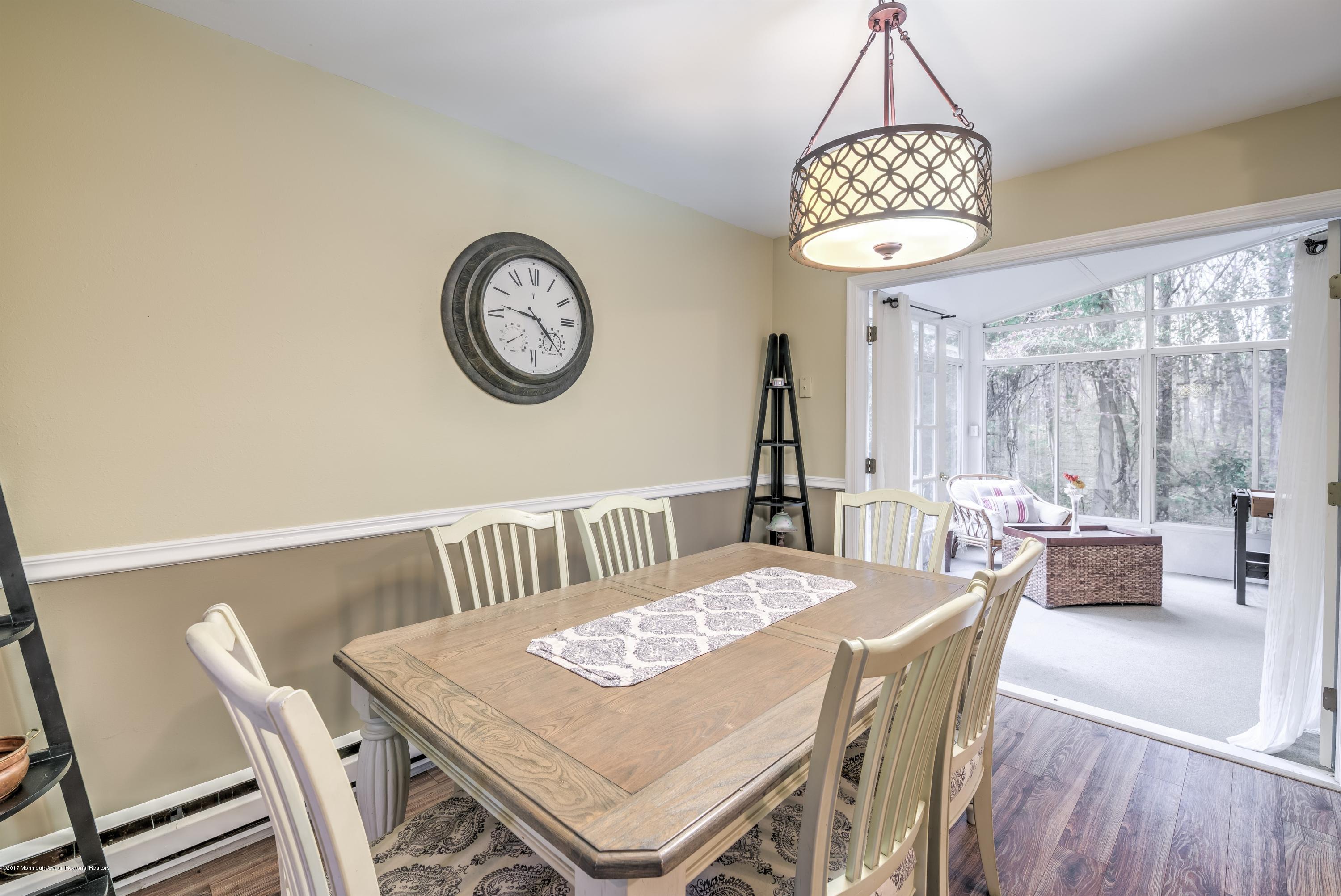 15 Reiner Road Cream Ridge, NJ 08514 - Photo 8 of 27 a view of a dining room with furniture window and wooden floor