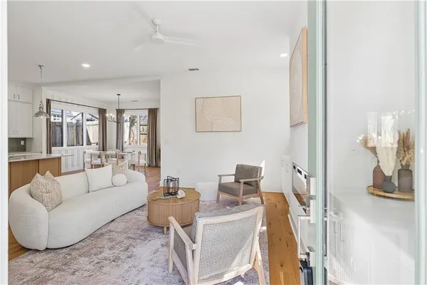 a living room with furniture and a table