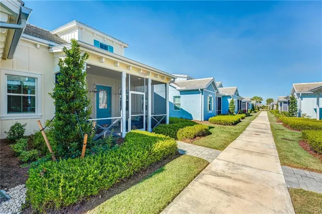 a view of a building next to a big yard