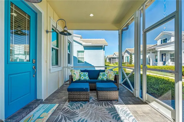 a living room filled with furniture and a rug