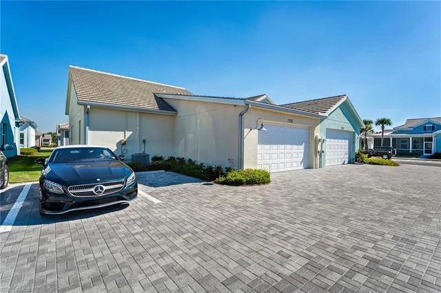 a car parked in front of a house