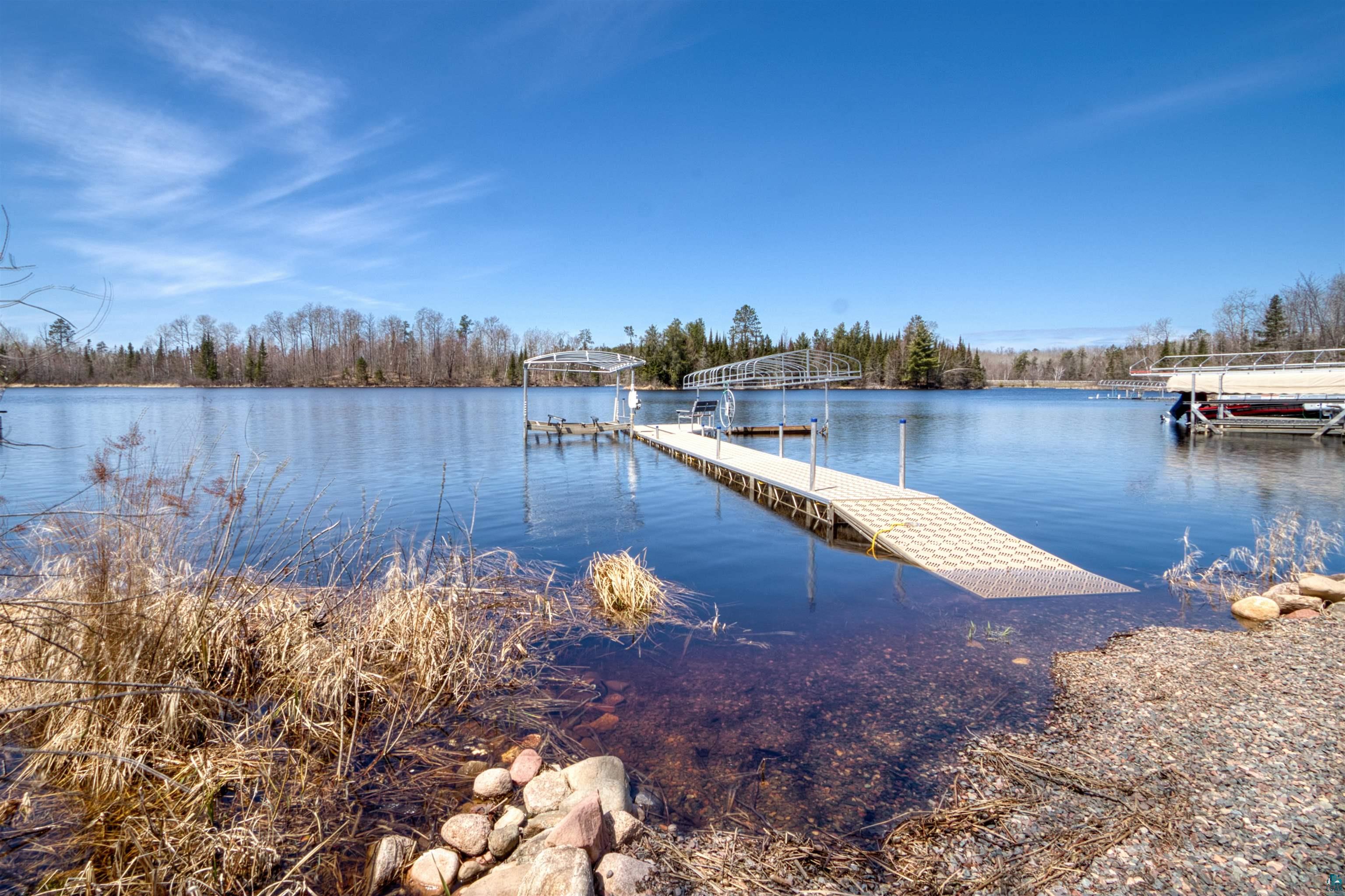 9629 North Dun Rovin Road Hayward, WI 54843 - Photo 6 of 39 View of dock with a water view