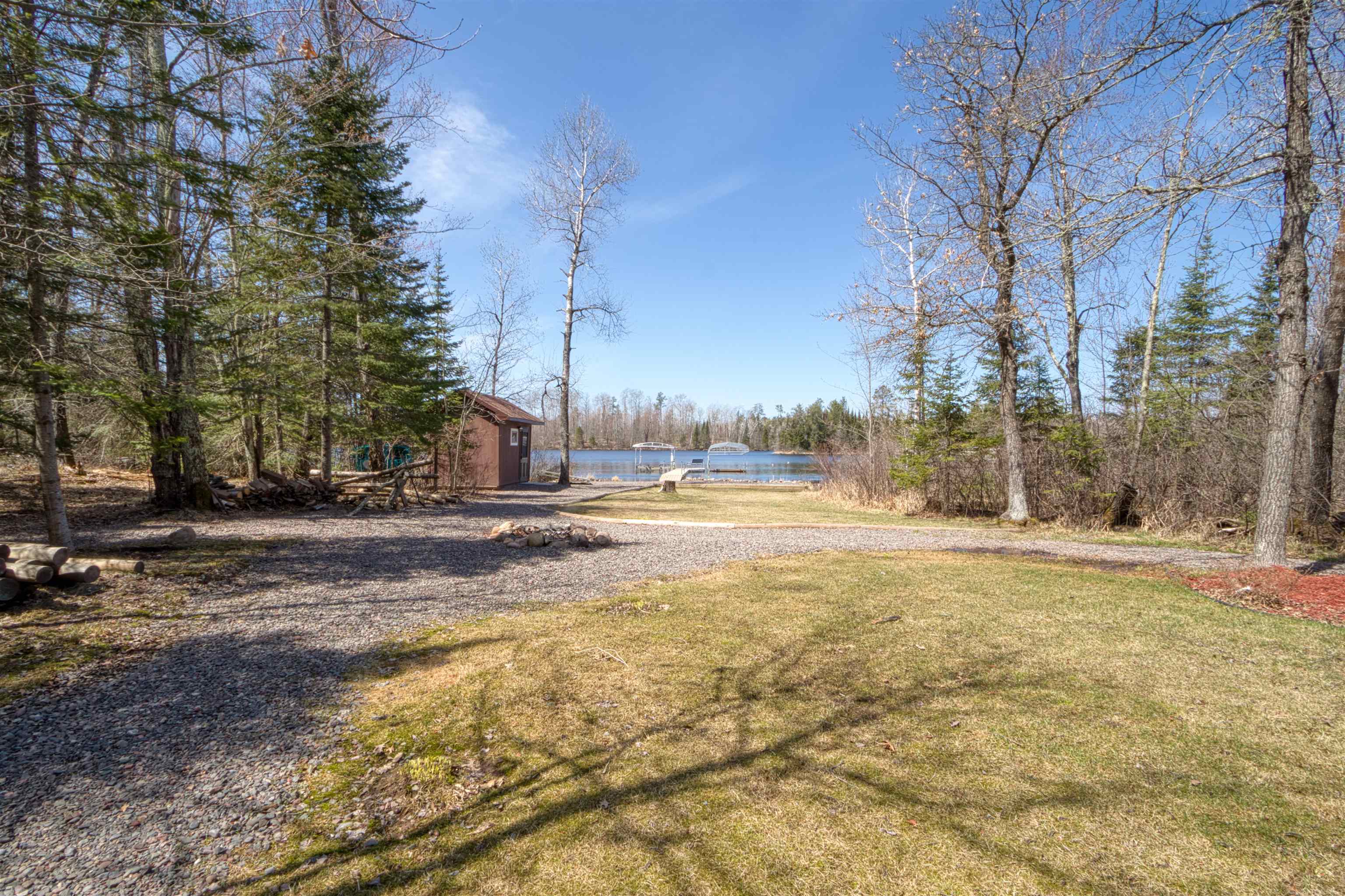 9629 North Dun Rovin Road Hayward, WI 54843 - Photo 10 of 39 View of yard featuring a water view