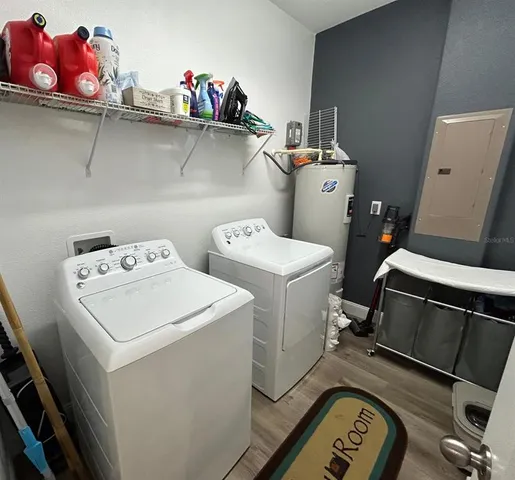 a utility room with dryer and washer