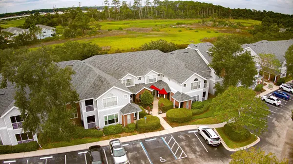 a view of a house with a ocean view