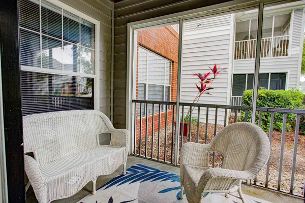 a view of a porch with chairs